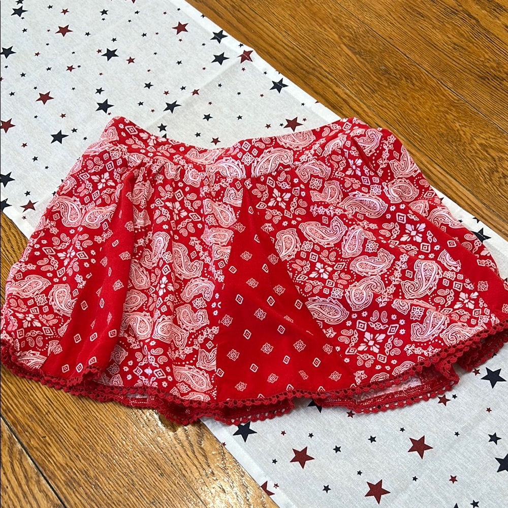 Justice red bandanna print skort.  Girls Size 12.  Elastic waist in back.